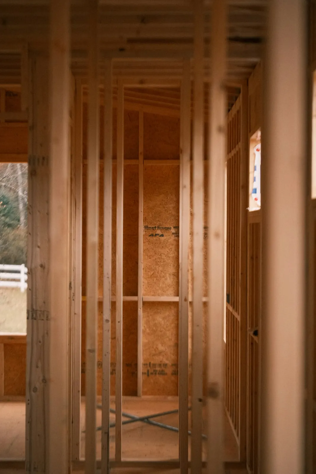 Wood stud framing inside a house under construction